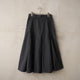 LIP CLOTH FLARE TUCK SKIRT