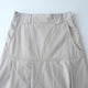 LIP CLOTH FLARE TUCK SKIRT