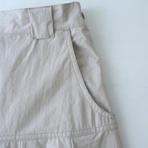 LIP CLOTH FLARE TUCK SKIRT