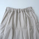 LIP CLOTH FLARE TUCK SKIRT