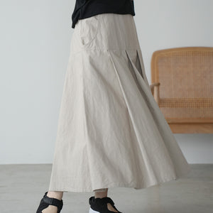 LIP CLOTH FLARE TUCK SKIRT